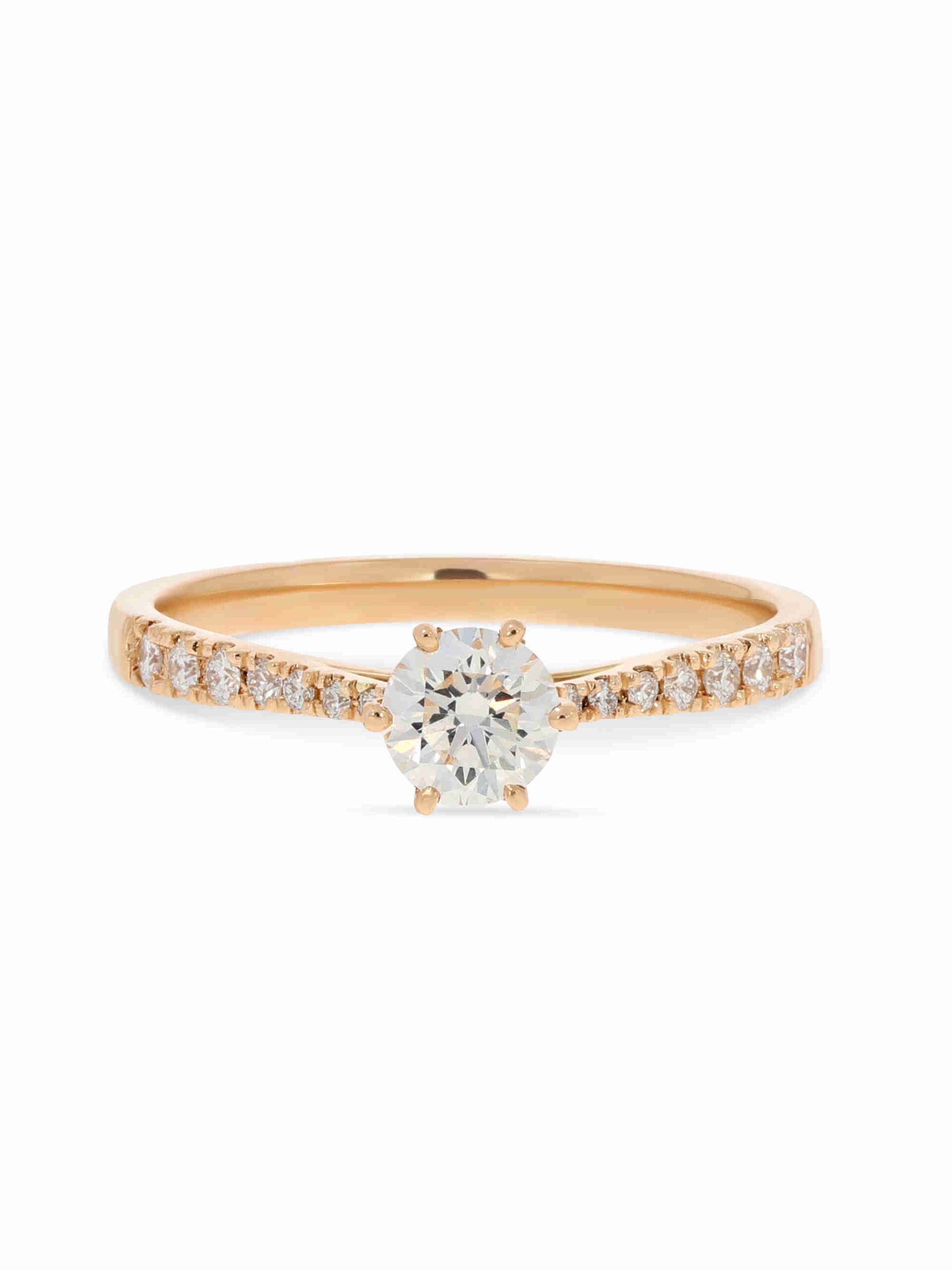 Ein Verlobungsring in Roségold 750/- mit einem Brillanten 0,30 ct. und zusätzlich seitlichen Brillanten