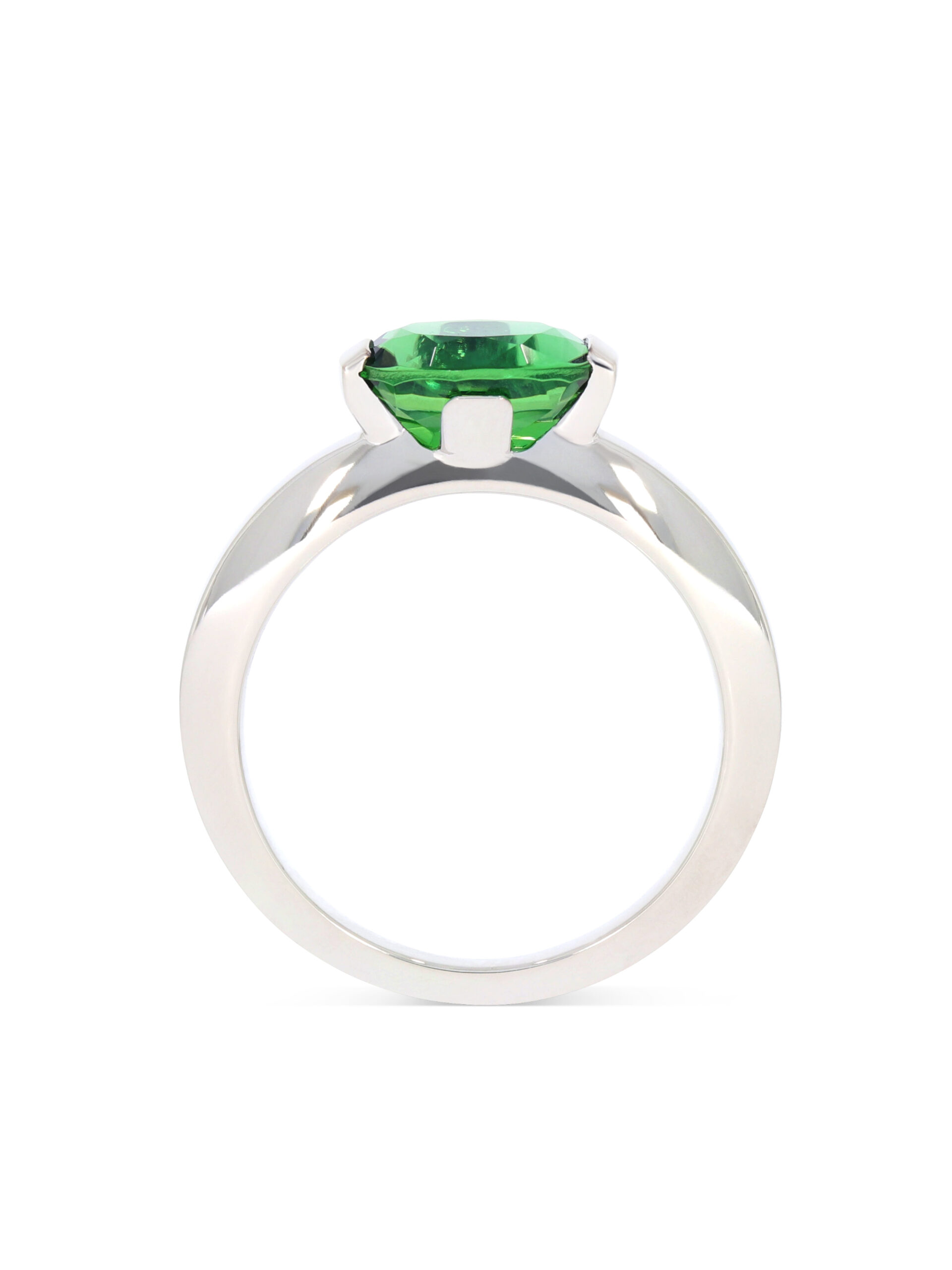 Ein sehr seltener grüner Turmalin (Chrom), der nur seitlich in eine Ringschine in 750/- Weißgold gefasst ist.